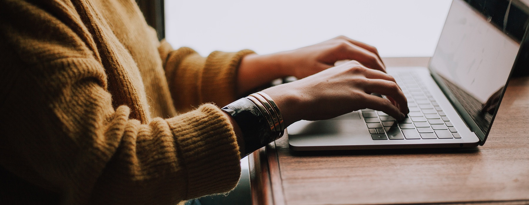 Person working on their computer at home